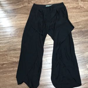 Black lightweight flow slacks with open cut